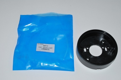 Image of LR009773, a 'REAR LAMP BASE DEFENDER FROM 2007 ON' part