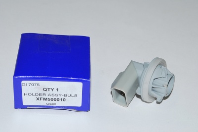 Image of XFM500010, a 'BULB HOLDER - DOUBLE-POLE - FREELANDER 1' part