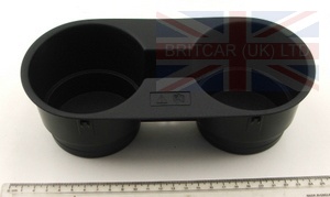 Image of FBD500130PUY, a 'CUP HOLDER CENTER FRONT DASH BLACK FL' part