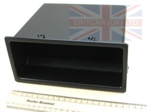 Image of FHM000040PMA, a 'BIN FACIA CONSOLE LESS RADIO DEFENDER FROM VIN 2A000001' part