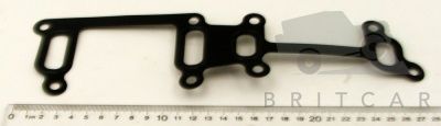 Image of LR004415, a 'WATER MANIFOLD GASKET TDCI DEFENDER FROM 2007 ON' part