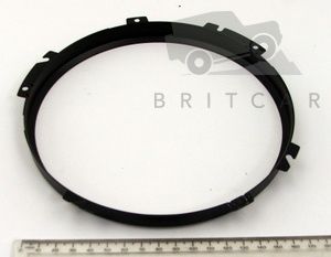 Image of STC3018, a 'HEADLAMP BEZEL BLACK DEFENDER - RANGE ROVER CLASSIC' part